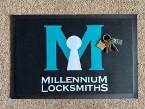 Millennium Locksmiths Mat Fob and Keys