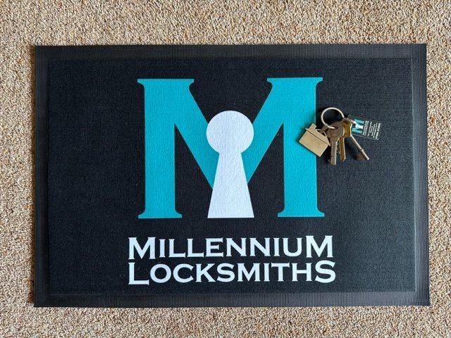 Millennium Locksmiths Mat Fob and Keys